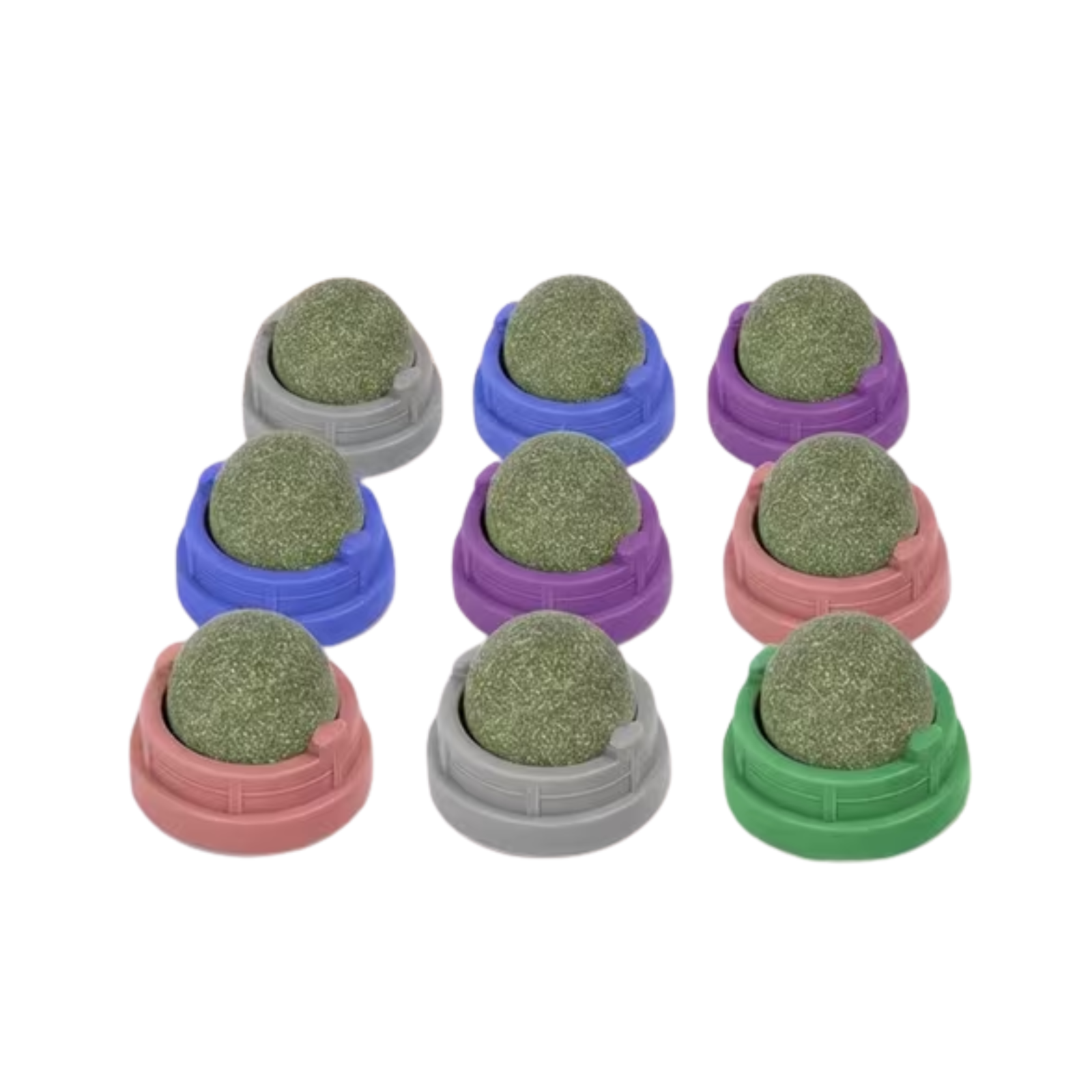 Nine small round green textured balls arranged in a 3-by-3 grid, each resting in a different colored circular base (gray, blue, purple, pink, green).