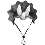 A dinosaur-style costume hat with a textured black and gray frill brim, three white faux-fur horns, and an adjustable black chin strap, shown on a plain white background.