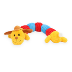 A yellow plush dog toy shaped like a caterpillar, with a red and blue ribbed body, brown floppy ears, and a small orange hat, photographed on a plain white background.