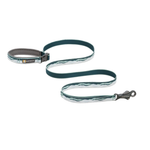 A dog leash with a dark teal green and white wavy patterned strap, a gray padded handle, and a dark metal snap hook, shown on a plain white background.