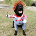 A black dog wearing doll outfit set featuring a red and white striped long-sleeve shirt, light blue overalls with red buttons and 'Good Dog' embroidery, a brown wig, and a toy knife accessory.