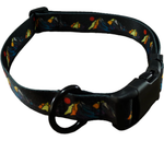 A black dog collar with a colorful mountain and campfire pattern, featuring a black plastic buckle and a black metal ring.