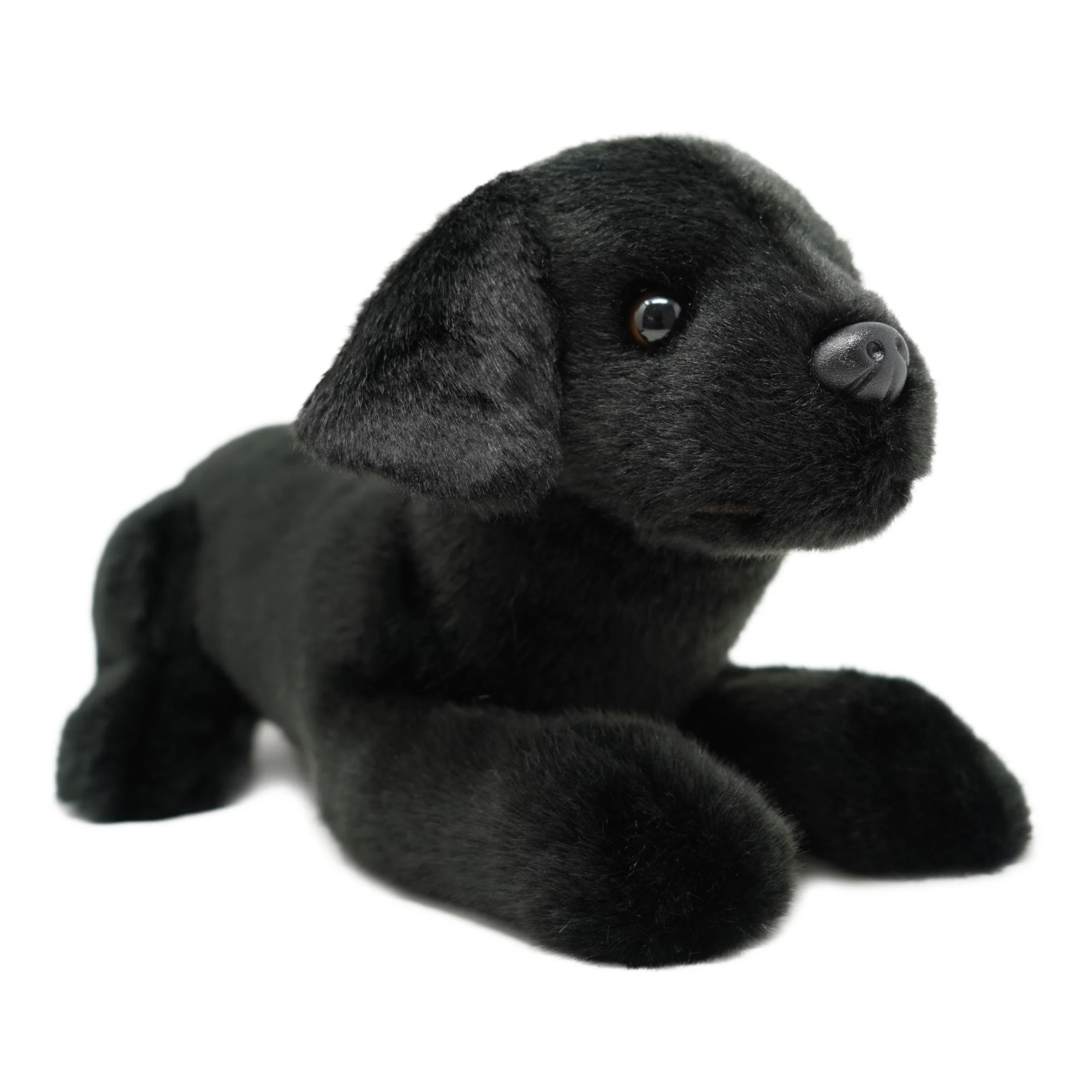 A black plush puppy toy with soft faux fur, realistic black eyes, and a black nose, posed lying down on a plain white background.