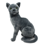 A gray plush cat toy with green eyes, sitting on a plain white background.