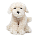A fluffy cream-colored plush dog toy with black eyes and a black nose, sitting on a solid white background.