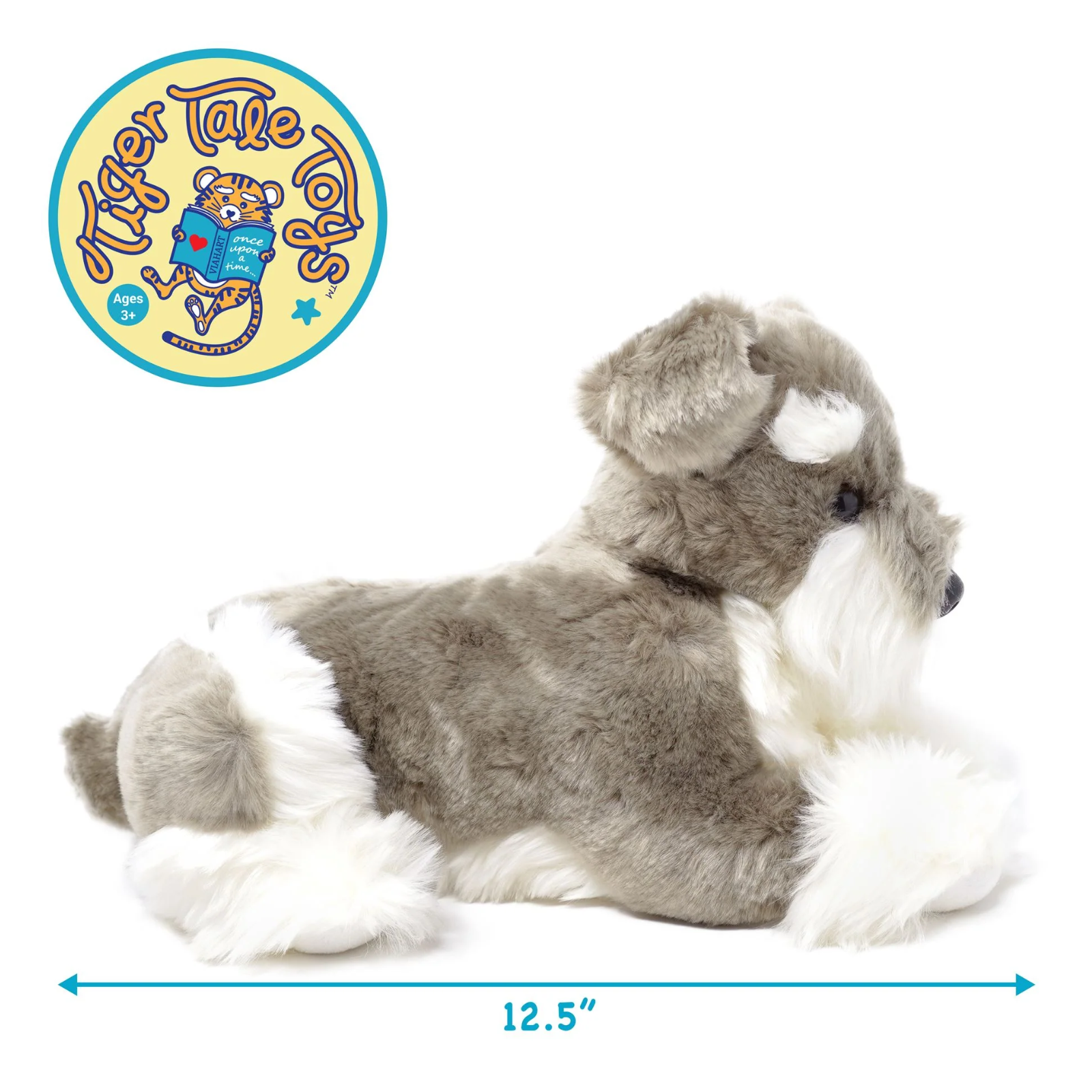 A plush dog toy styled like a gray and white Schnauzer, lying down on a white background with blue direction arrows indicating 12.5 inches long body.