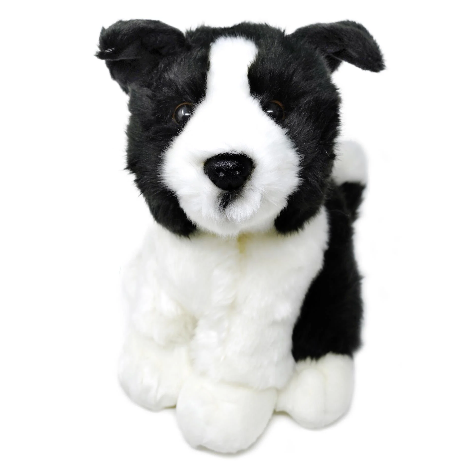 A black and white plush puppy toy with floppy ears, a white muzzle and chest, and a black back, photographed on a plain white background.