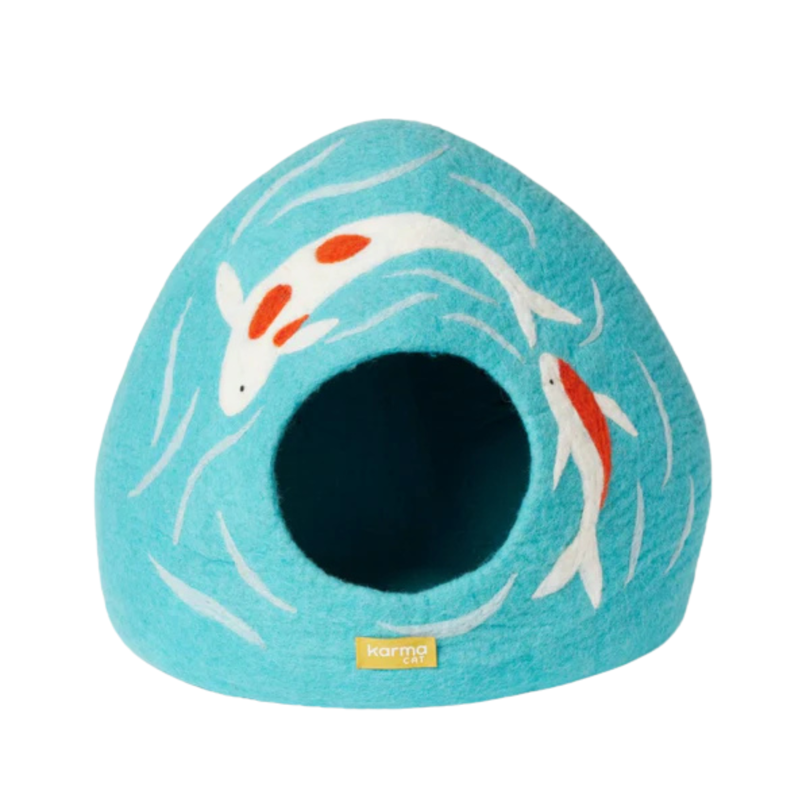 A teal blue felt pet house shaped like an underwater scene, featuring white koi fish with orange accents and a dark opening in the center. A small yellow tag with the brand name 'karma cat' is visible at the bottom.