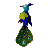 Felted peacock toy on a white background
