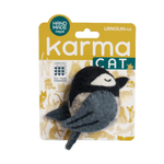A felt cat toy shaped like a sleeping bird with a black head, white eye patch, and gray body, attached to a yellow and white Karma Cat retail card. The card includes text such as 'HAND MADE nepal', 'LANOLIN rich', and 'karma CAT'.