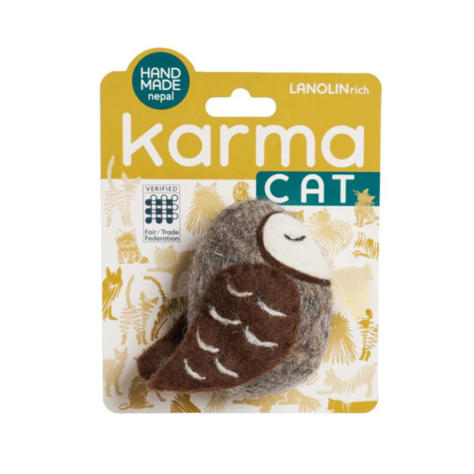 A felt owl-shaped cat toy in brown and gray with white accents, packaged on a yellow and white backing card labeled 'karma CAT' and 'HAND MADE nepal'.