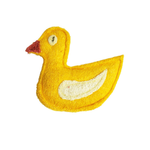 A yellow felt-like duck toy or plush patch with a red beak, white wing, and small embroidered eye, shown on a plain white background.