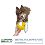 A brown and white puppy is shown holding a yellow duck-shaped dog toy against a white background, with a human hand supporting the toy. The image includes the brand name 'Loofah Dental Shredding Toy' and a safety warning text box.
