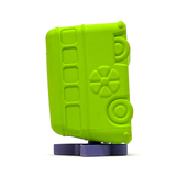A bright lime green bus-shaped dog toy with embossed window and flower details, standing on a purple base against a plain white background.