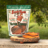Package of Sam's Yams Veggie Rawhides sweet potato dog chews with a wooden platform displaying the treats.