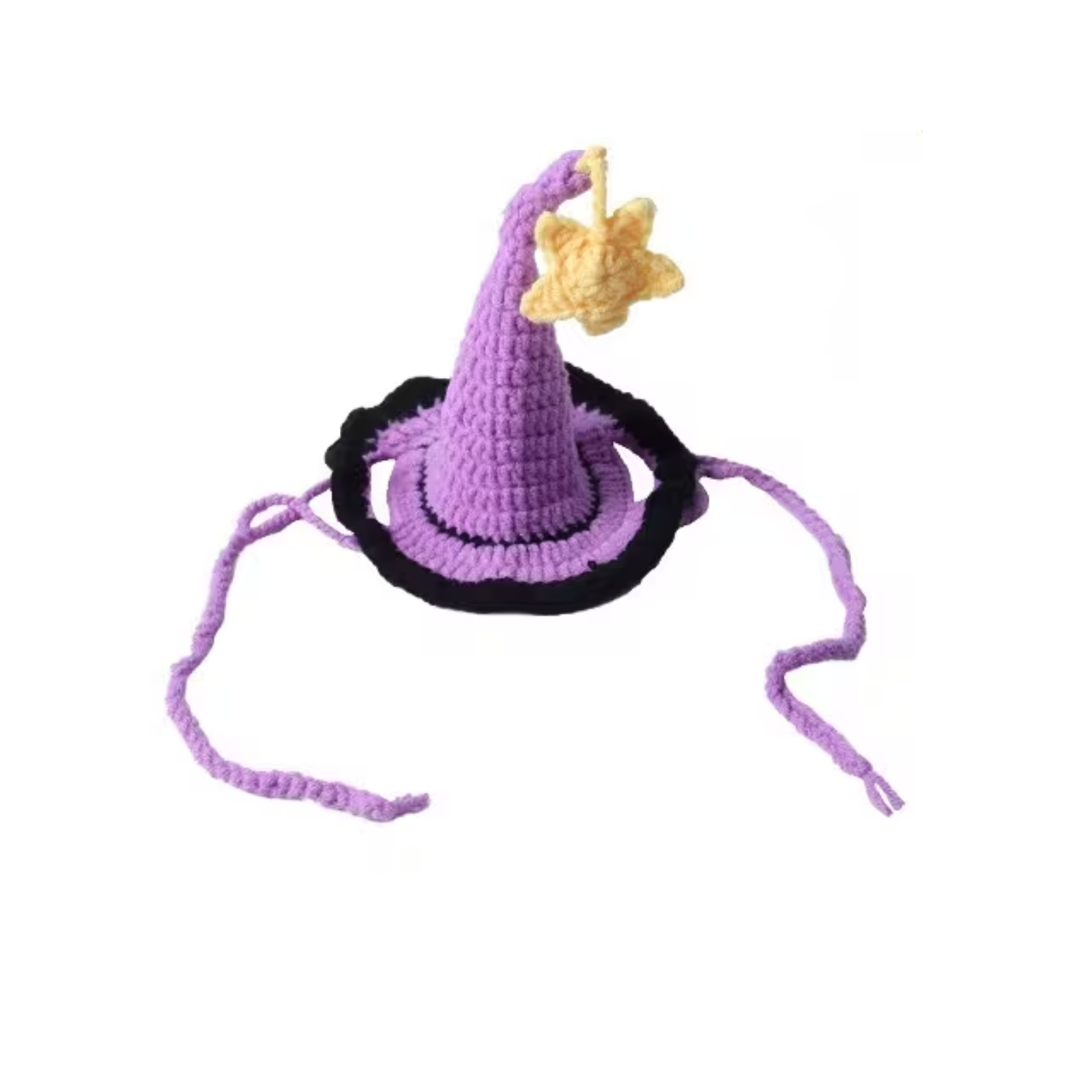 A small crocheted witch hat in purple with a black brim, a yellow star on the tip, and purple hanging ties, shown on a plain white background.
