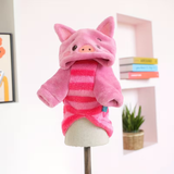 Pink pig costume on a mannequin with a white background