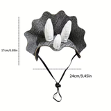 A dinosaur-style hat with a black textured crown, white felt horns, and a black chin strap, shown with dimension lines and measurements of 17cm/6.69in and 24cm/9.45in