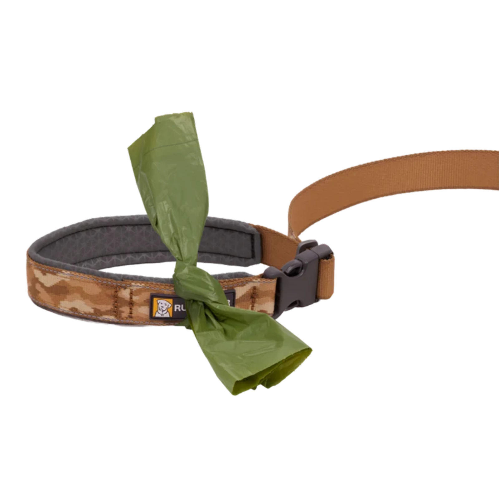 Brown and tan dog leash handle with a green plastic bag tied to it.