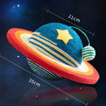 Colorful toy resembling a planet with star and measurements on a space-themed background