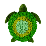 Plush green turtle shaped toy on a white background.