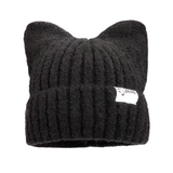 A black colored knit hat with cat ears on the top and brand tag on the rim