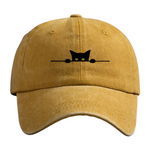 Yellow cap with a black cat illustration on a white background